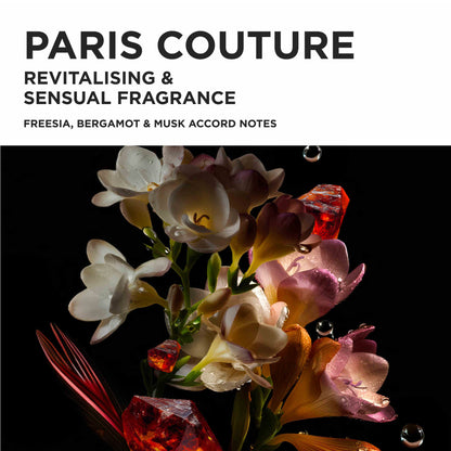 Album-style cover art with the text 'PARIS COUTURE' and 'REVITALISING & SENSUAL FRAGRANCE' above a close-up floral still life on a black background. The flowers are white, cream, pink, and peach tones, with translucent red crystal-like accents and water droplets.