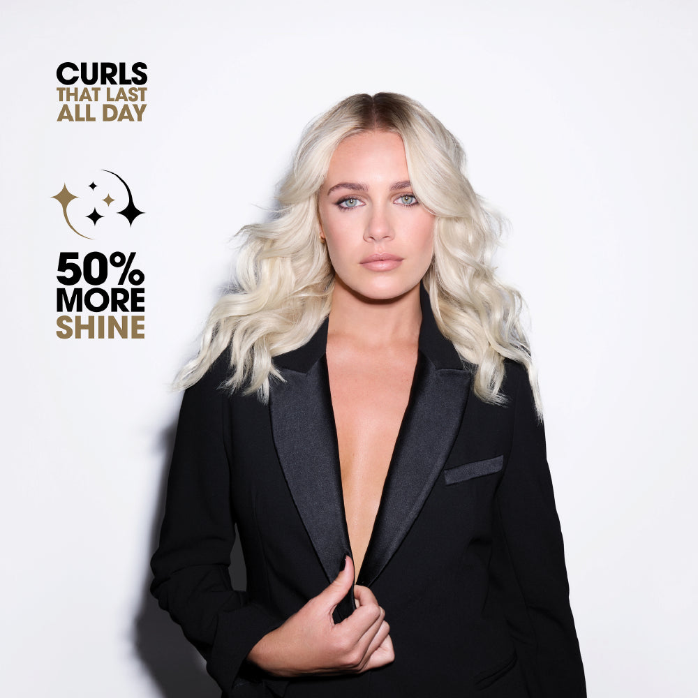 Woman with styled blonde hair wearing a black suit against a white background with text about hair product benefits.