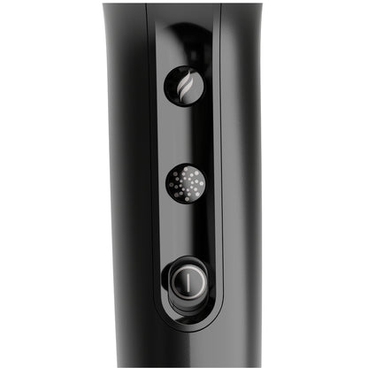 Close-up of a black electronic device with control buttons on a white background